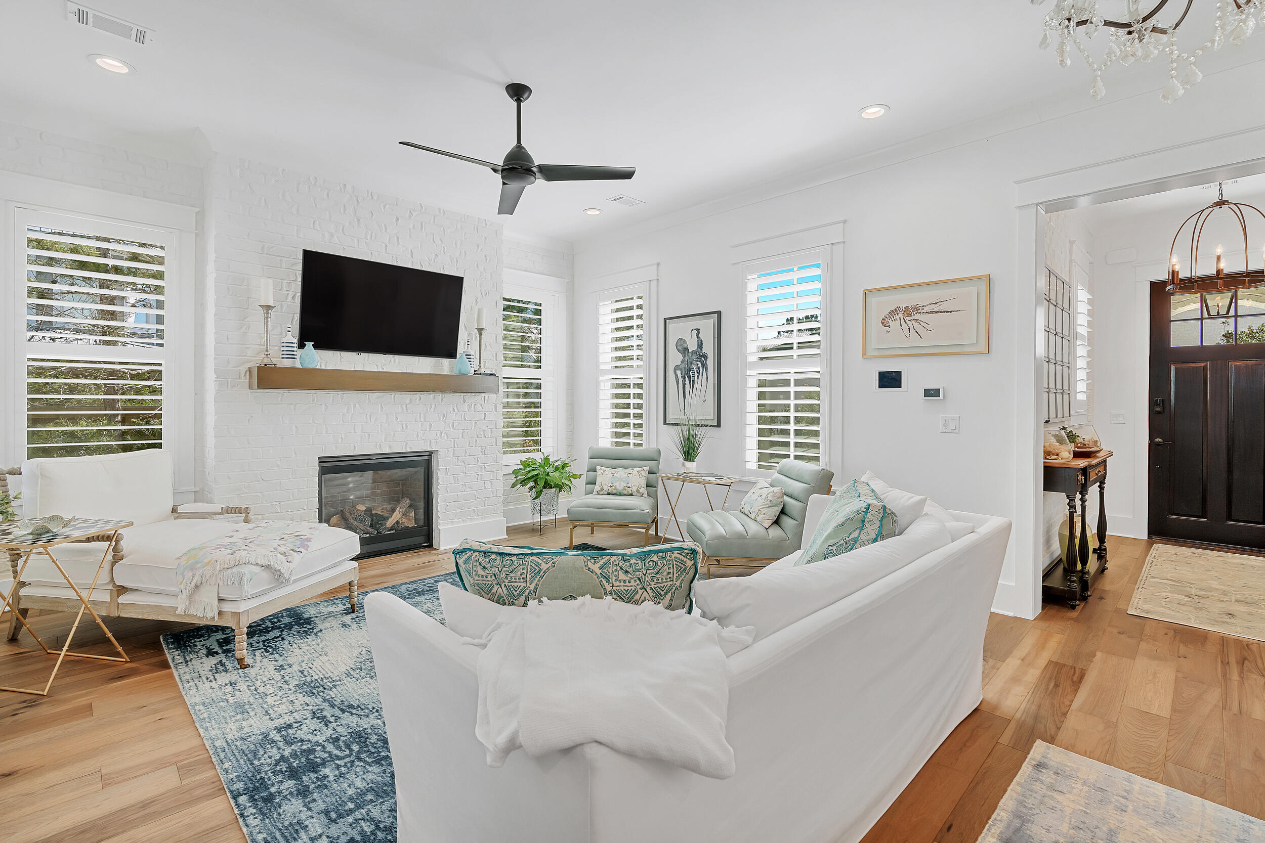 339 Ridgewalk Circle Santa Rosa Beach, FL 32459 - Photo 11 of 57 a living room with furniture fireplace and flat screen tv