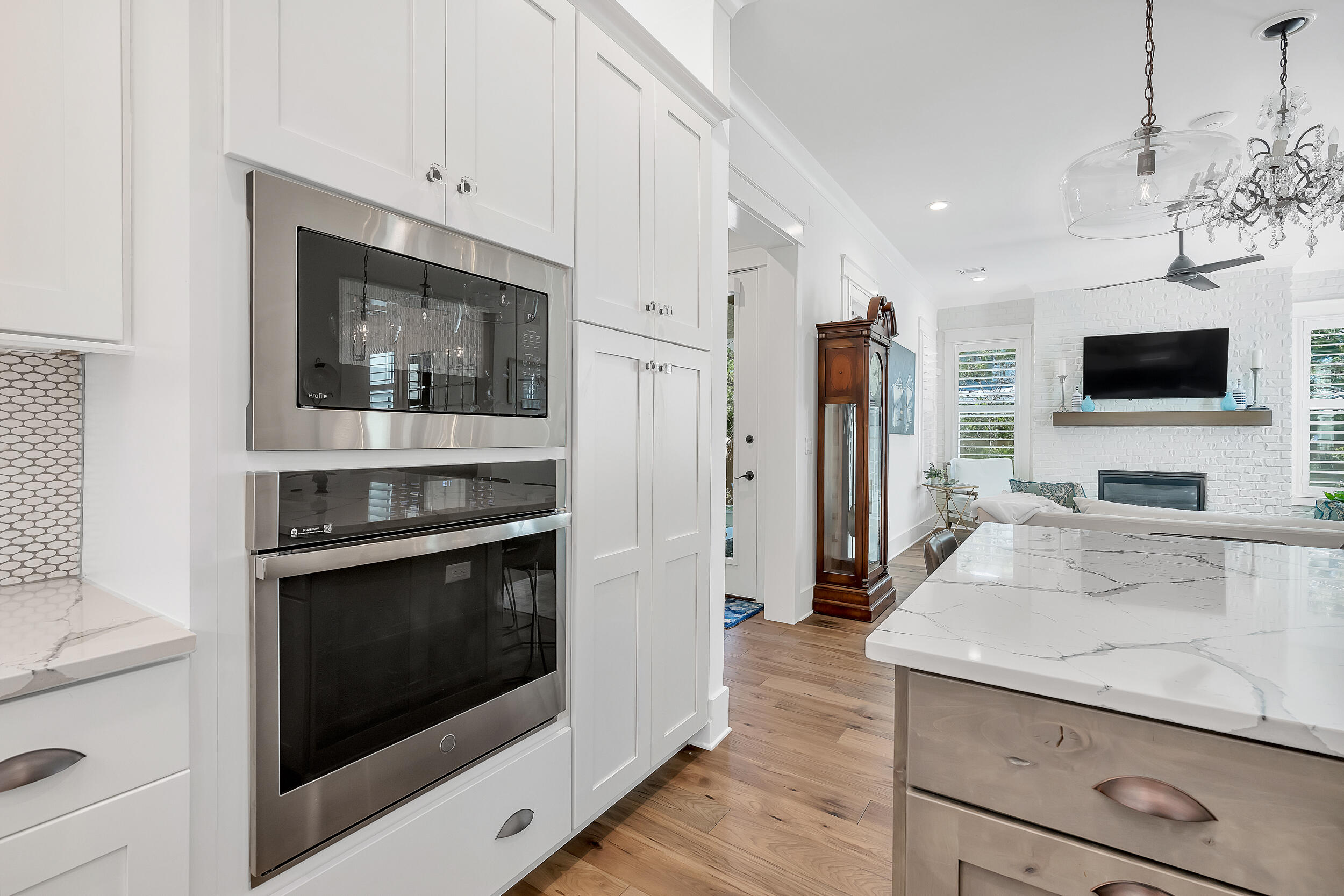 339 Ridgewalk Circle Santa Rosa Beach, FL 32459 - Photo 19 of 57 a kitchen with stainless steel appliances a stove microwave and refrigerator