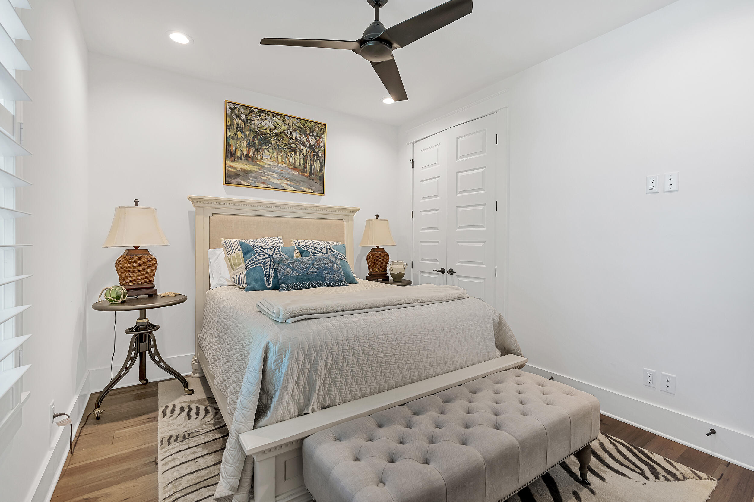 339 Ridgewalk Circle Santa Rosa Beach, FL 32459 - Photo 26 of 57 a bedroom with a bed and a table in it