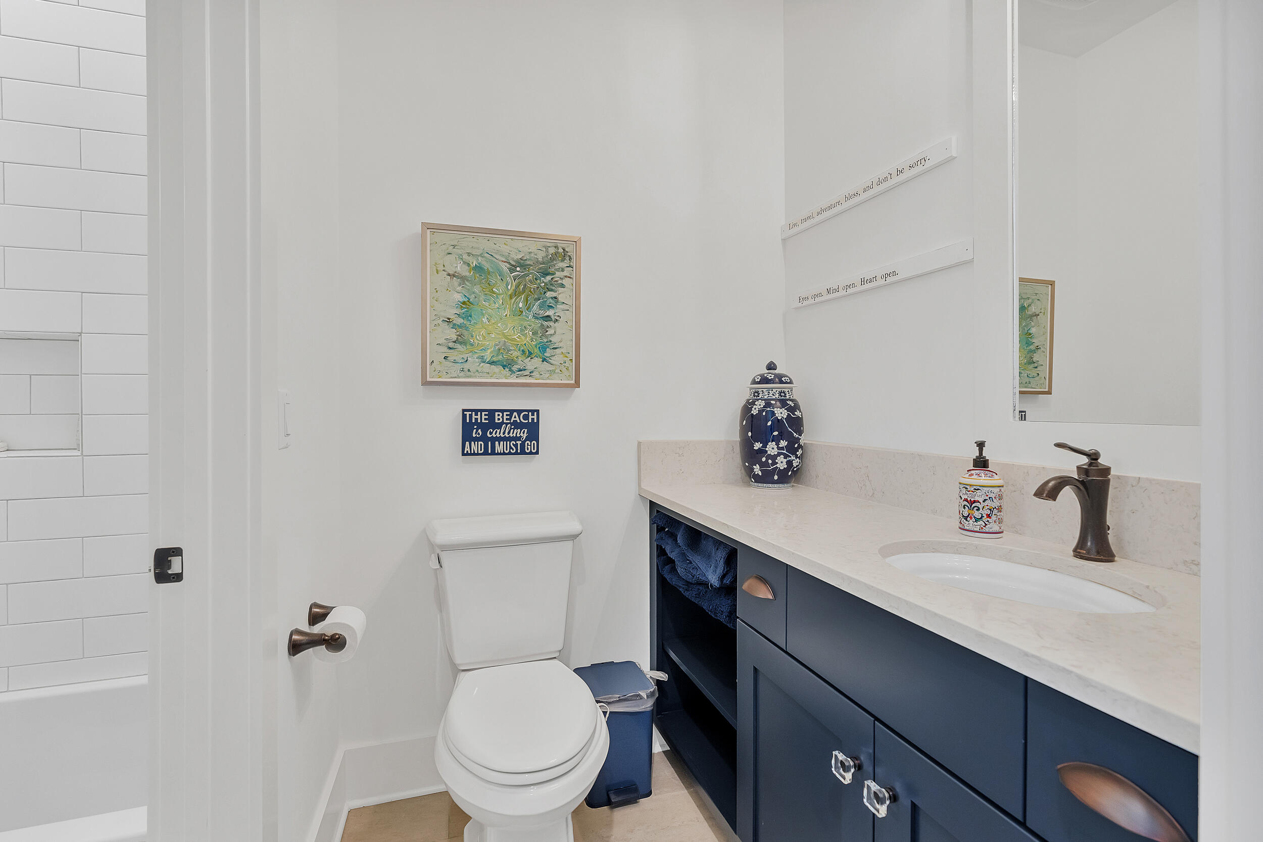 339 Ridgewalk Circle Santa Rosa Beach, FL 32459 - Photo 28 of 57 a bathroom with a toilet a sink and mirror