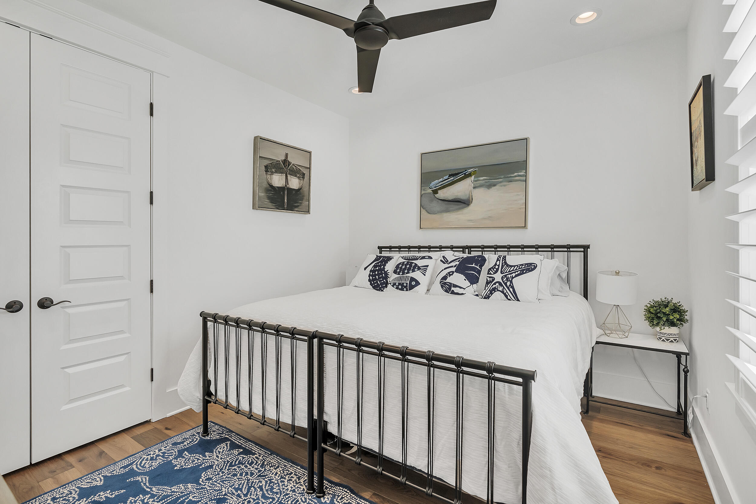 339 Ridgewalk Circle Santa Rosa Beach, FL 32459 - Photo 32 of 57 a bedroom with a bed and wooden floor