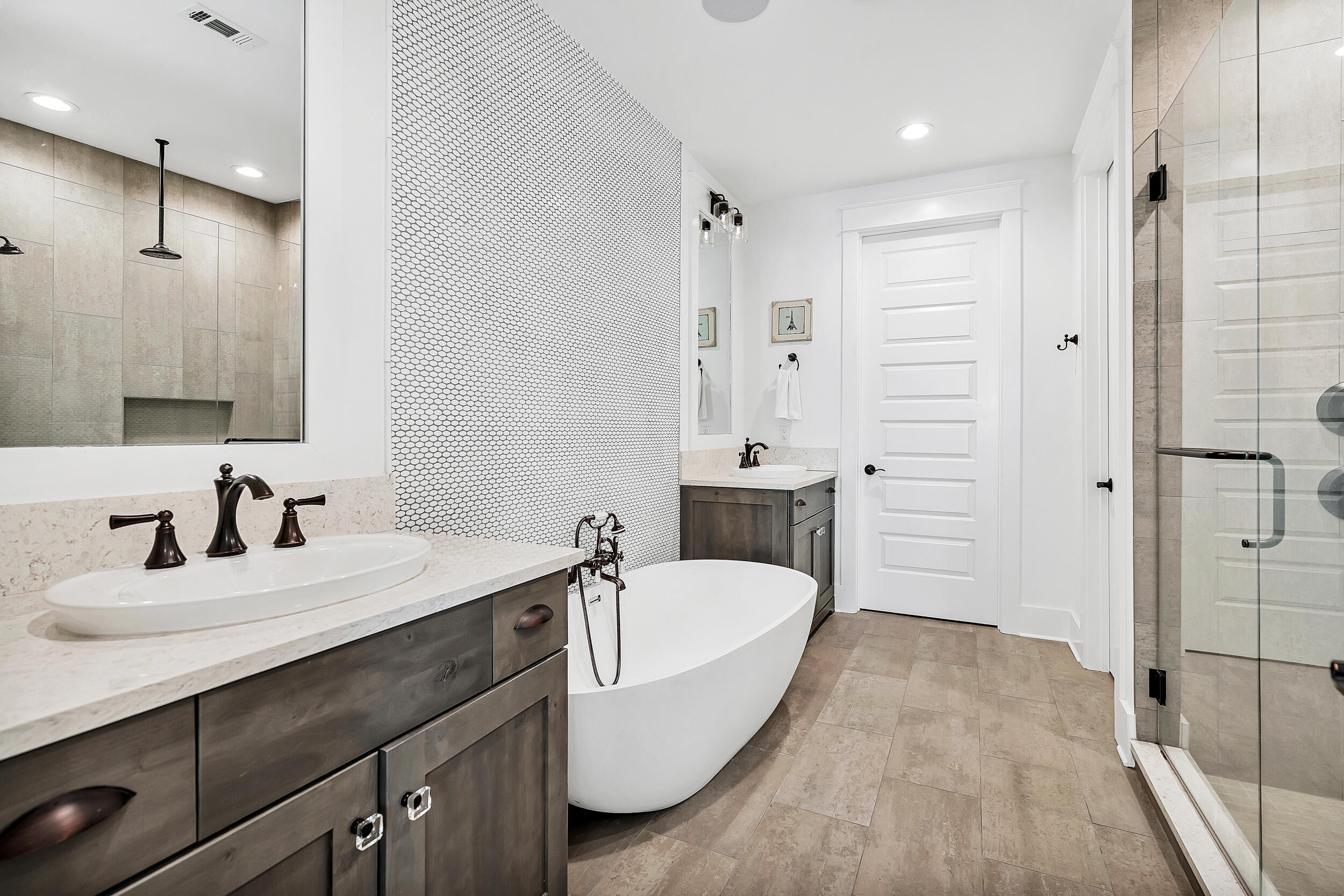 339 Ridgewalk Circle Santa Rosa Beach, FL 32459 - Photo 37 of 57 a bathroom with a tub sink and mirror