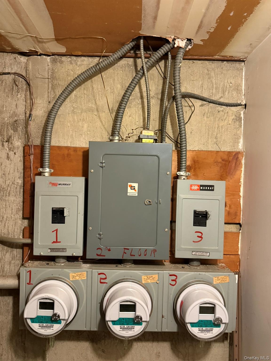 41-38 74th Street Queens, NY 11373 - Photo 13 of 17 a bathroom with a sink a mirror and a shower