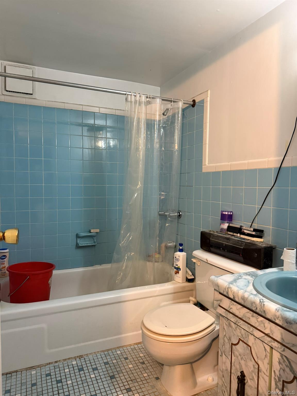 41-38 74th Street Queens, NY 11373 - Photo 16 of 17 a bathroom with a toilet a sink and bathtub