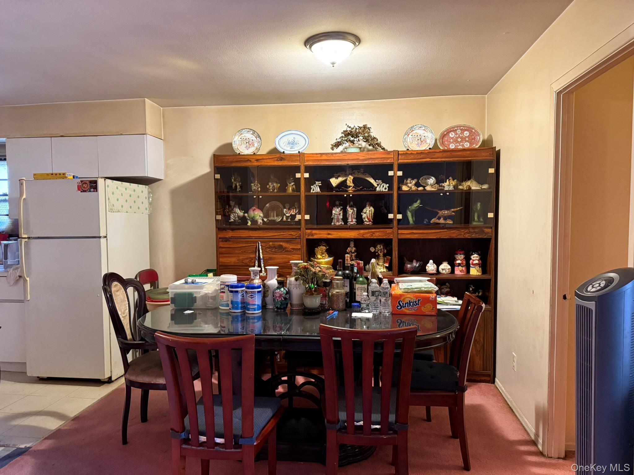 41-38 74th Street Queens, NY 11373 - Photo 4 of 17 a view of a dining room with furniture