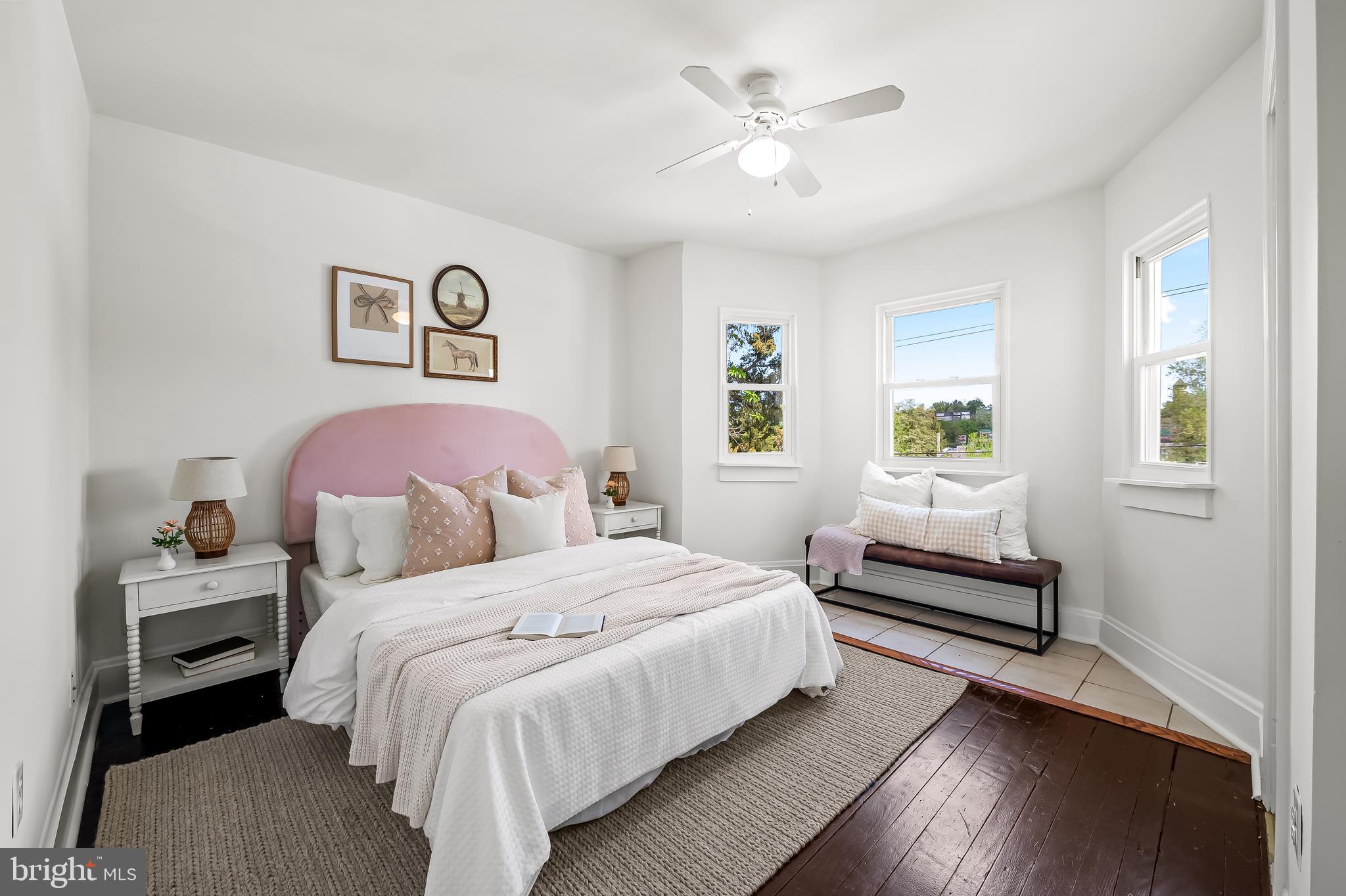 1015 Rectory Lane Baltimore, MD 21211 - Photo 12 of 28 a bedroom with a bed and a window