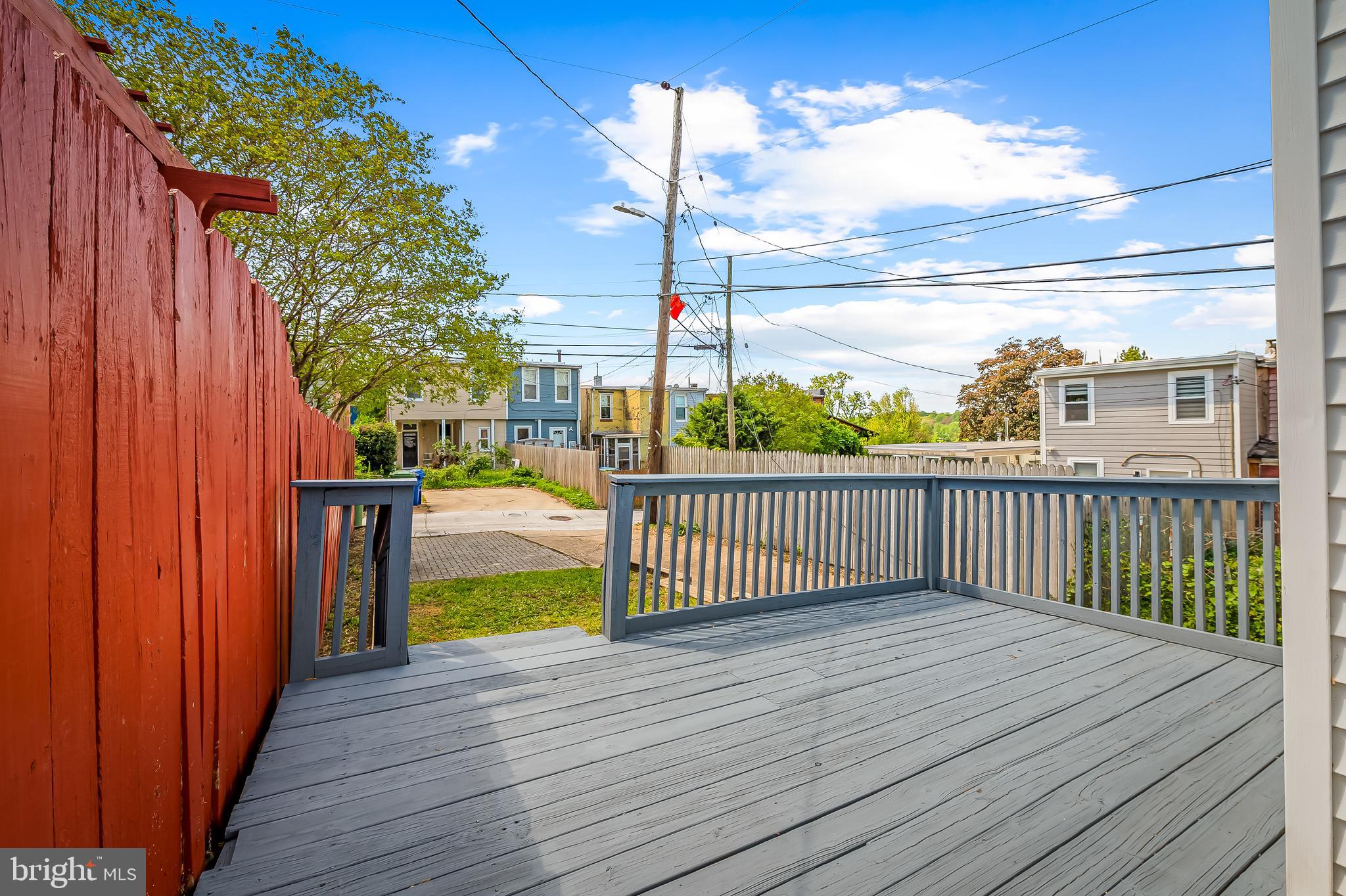 1015 Rectory Lane Baltimore, MD 21211 - Photo 20 of 28 a view of a balcony with wooden floor