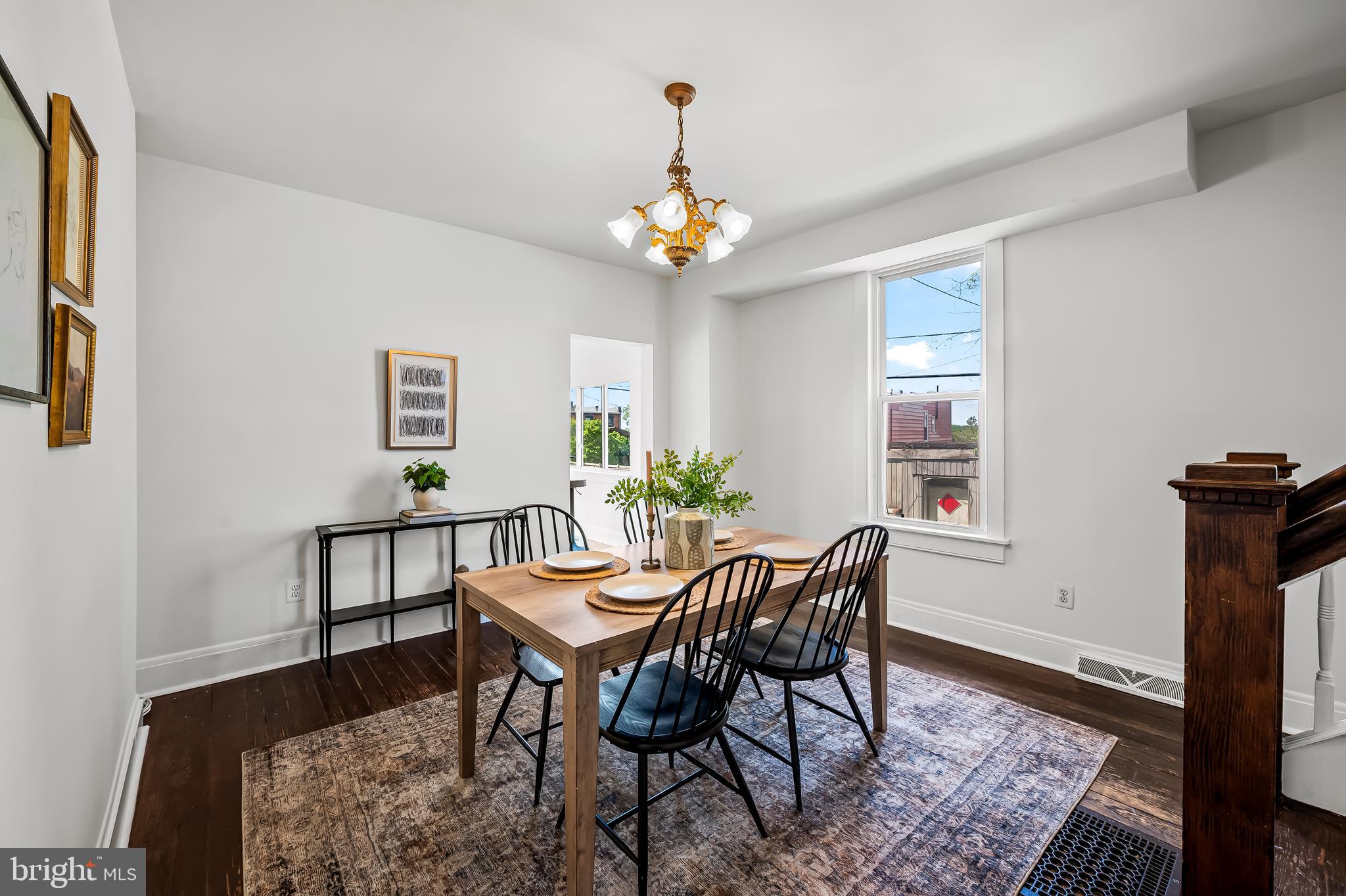 1015 Rectory Lane Baltimore, MD 21211 - Photo 6 of 28 a view of a dining room with furniture