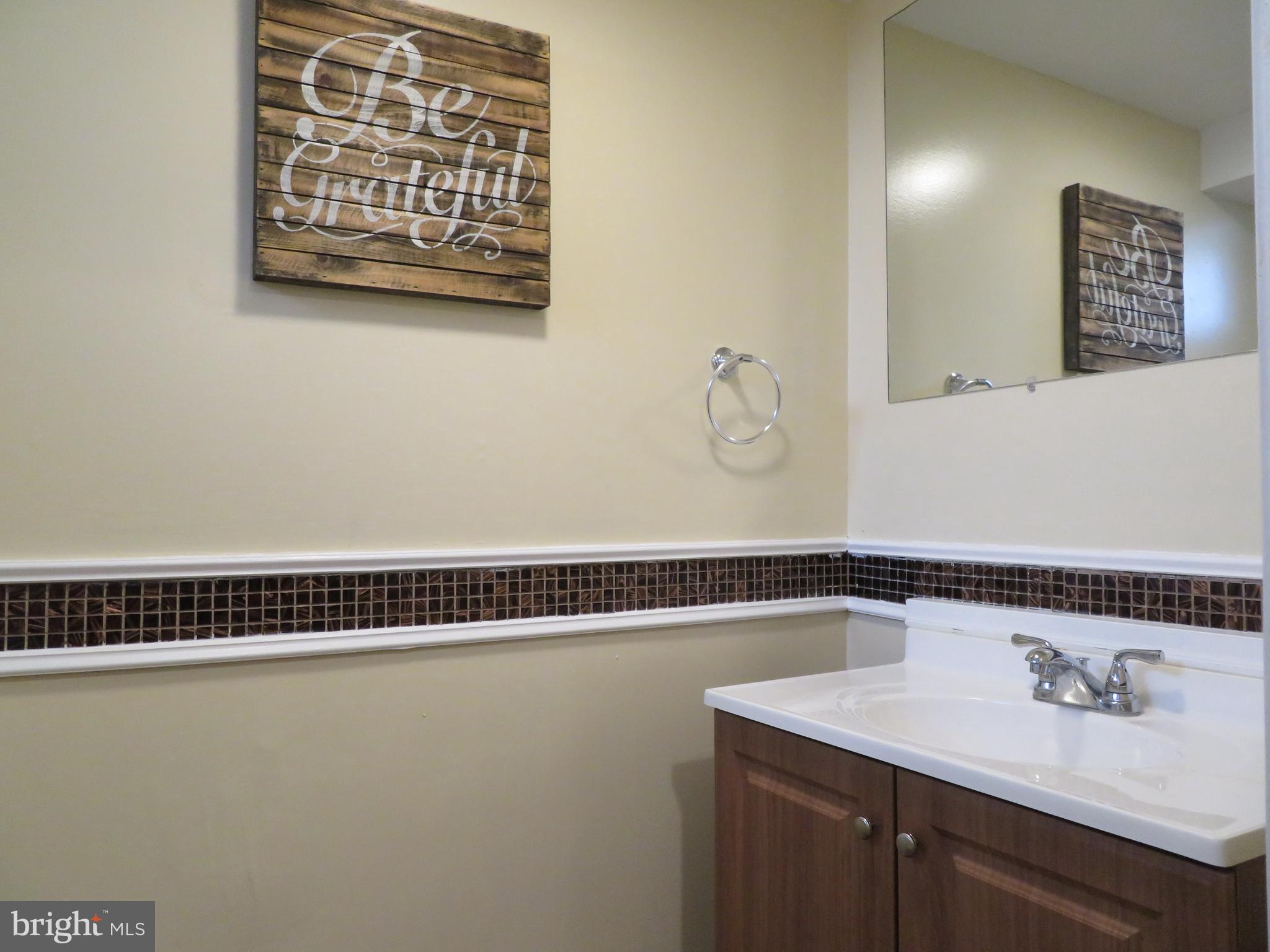 1628 Roundhill Road Baltimore, MD 21218 - Photo 23 of 24 Half Bathroom
