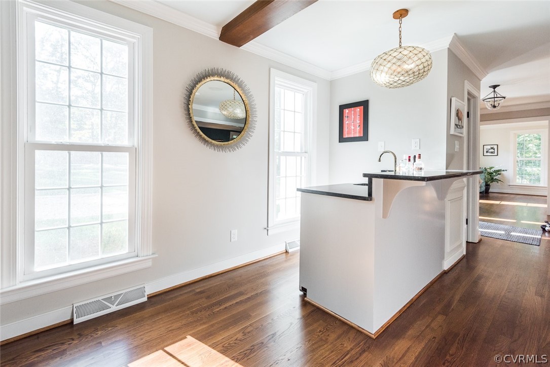 2921 Queenswood Road Midlothian, VA 23113 - Photo 8 of 41 a view of a kitchen with wooden floor and window