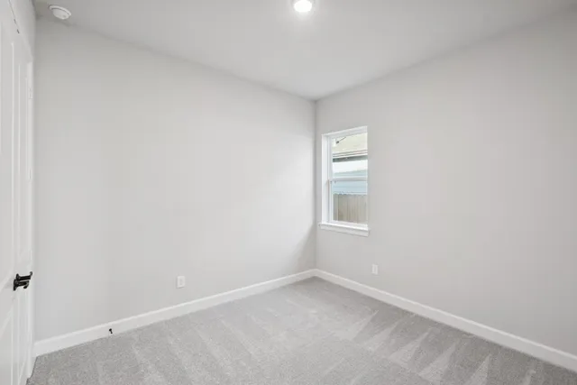 an empty room with a window