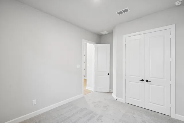 an empty room with closet