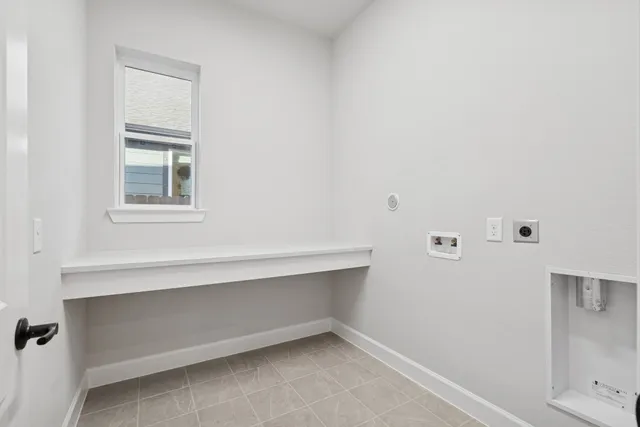 a room with a window and cabinet