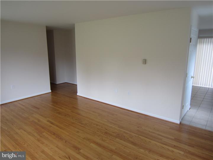 20 Johnstown Road Elkton, MD 21921 - Photo 8 of 23 a view of an empty room with wooden floor and a window