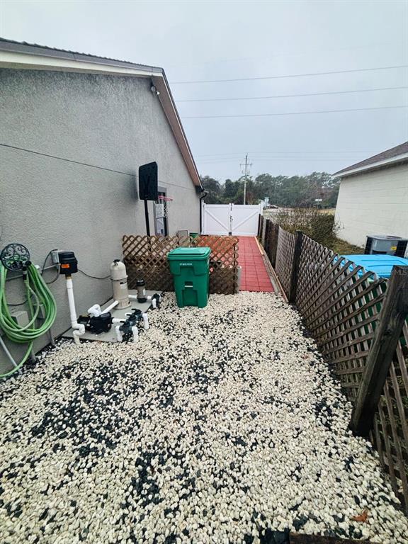 1464 Howland Boulevard Deltona, FL 32738 - Photo 25 of 55 a balcony view with couple of chairs