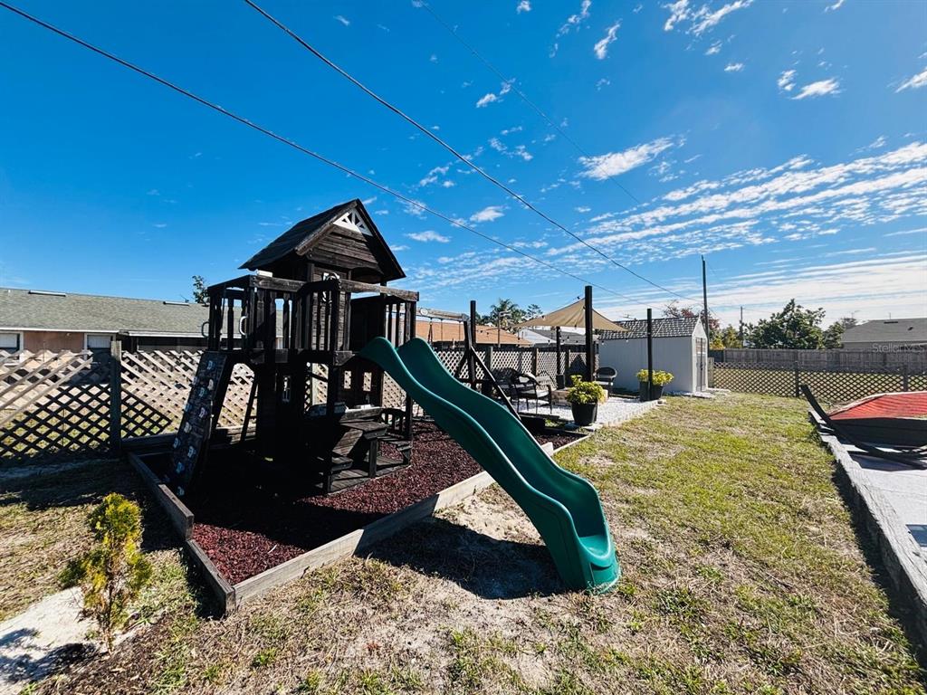 1464 Howland Boulevard Deltona, FL 32738 - Photo 29 of 55 a view of a roof deck with a patio