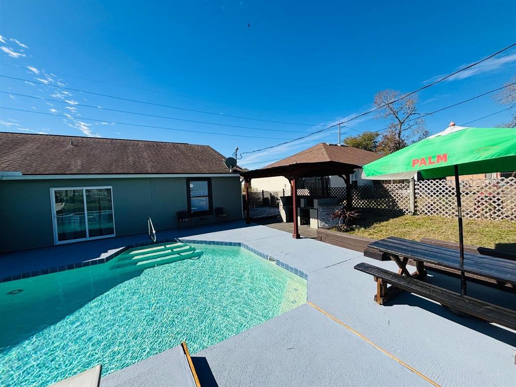 1464 Howland Boulevard Deltona, FL 32738 - Photo 36 of 55 a view of a house with backyard porch and sitting area