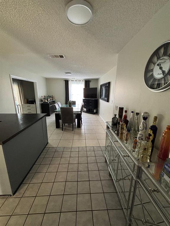 1464 Howland Boulevard Deltona, FL 32738 - Photo 49 of 55 a living room with furniture