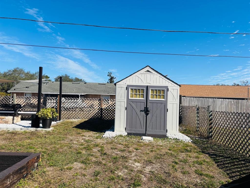 1464 Howland Boulevard Deltona, FL 32738 - Photo 53 of 55 a view of a house with a outdoor space