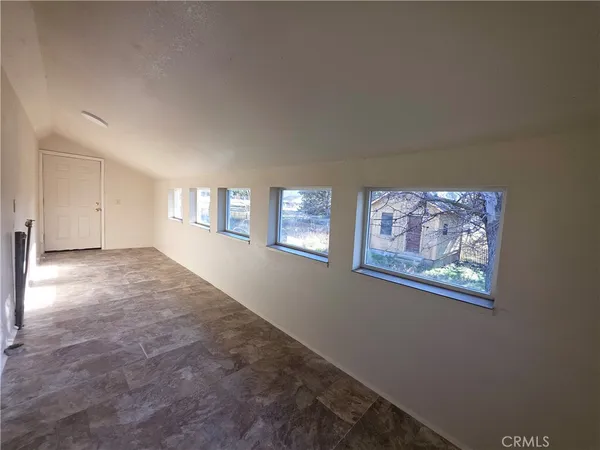 an empty room with a natural light