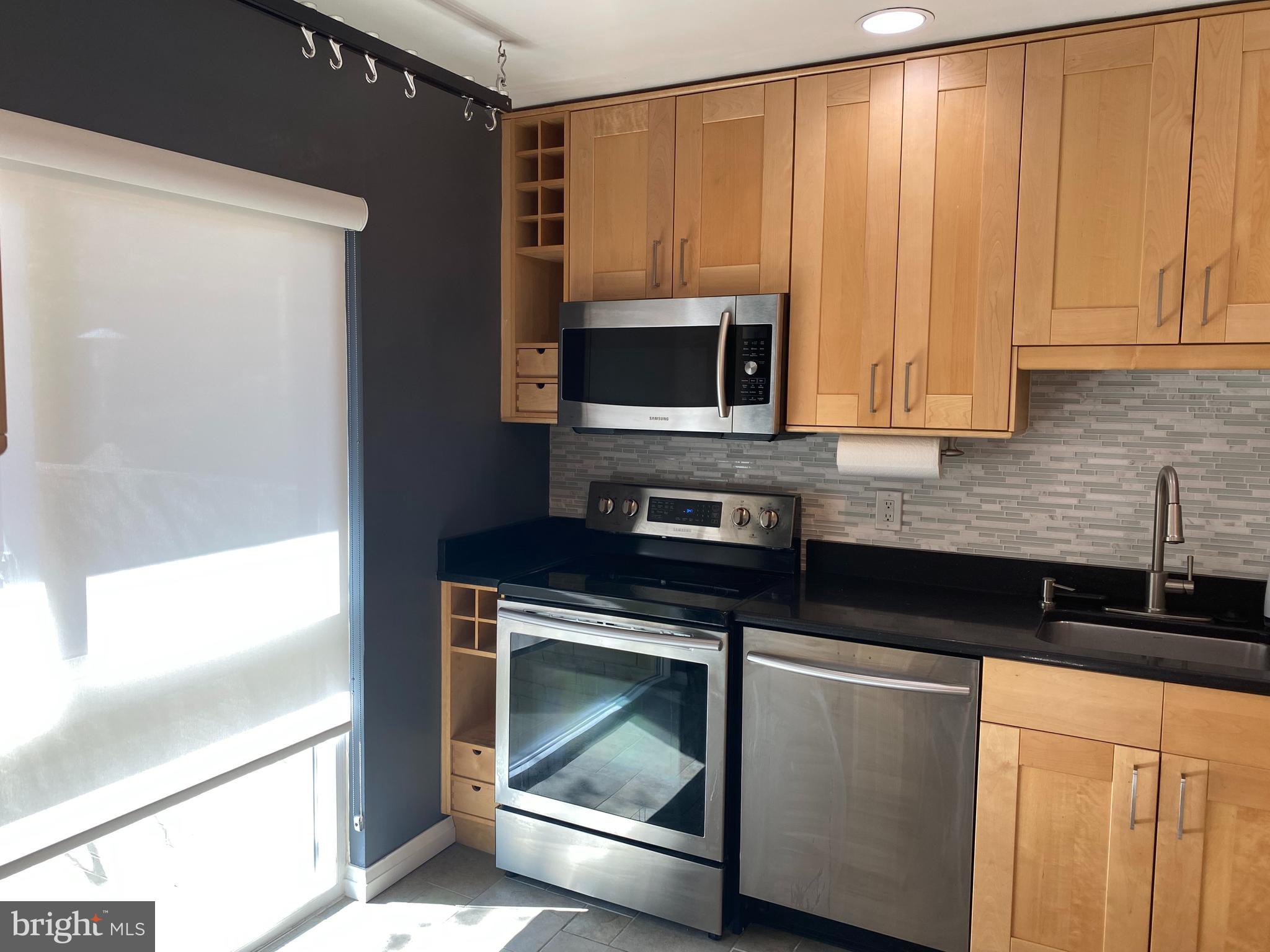 11142 Saffold Way Reston, VA 20190 - Photo 13 of 102 Granite countertops & stainless steel appliances