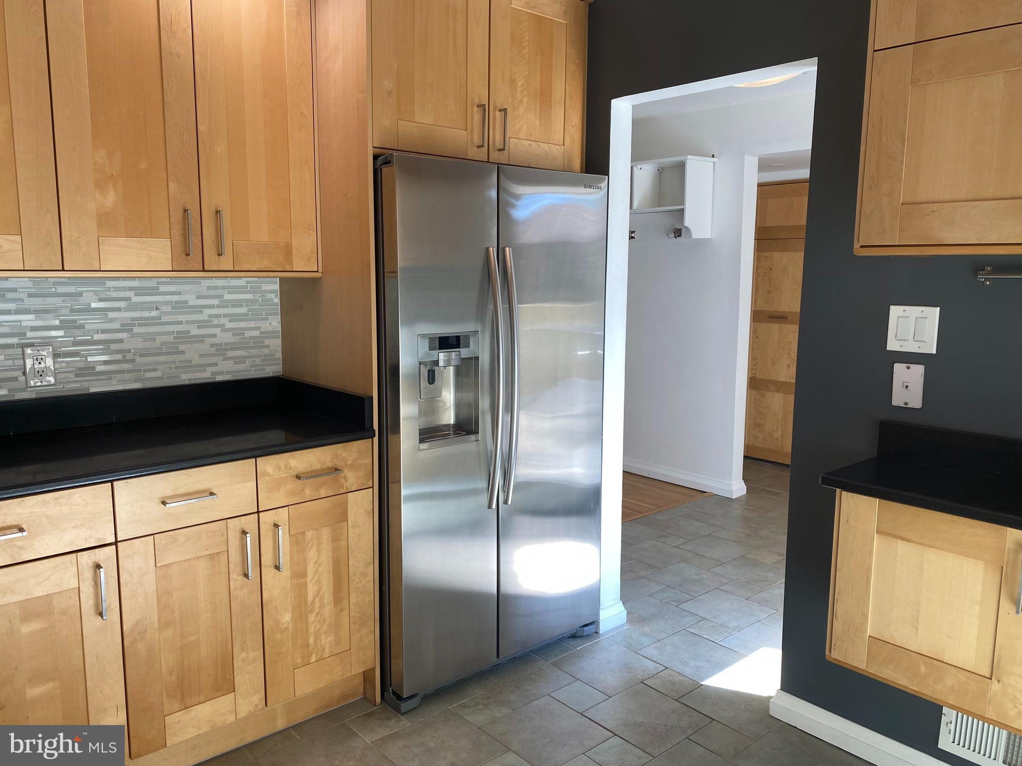 11142 Saffold Way Reston, VA 20190 - Photo 16 of 102 Kitchen looking into the foyer