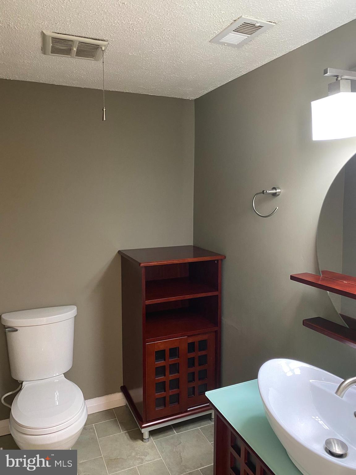 11142 Saffold Way Reston, VA 20190 - Photo 17 of 102 Main level powder room