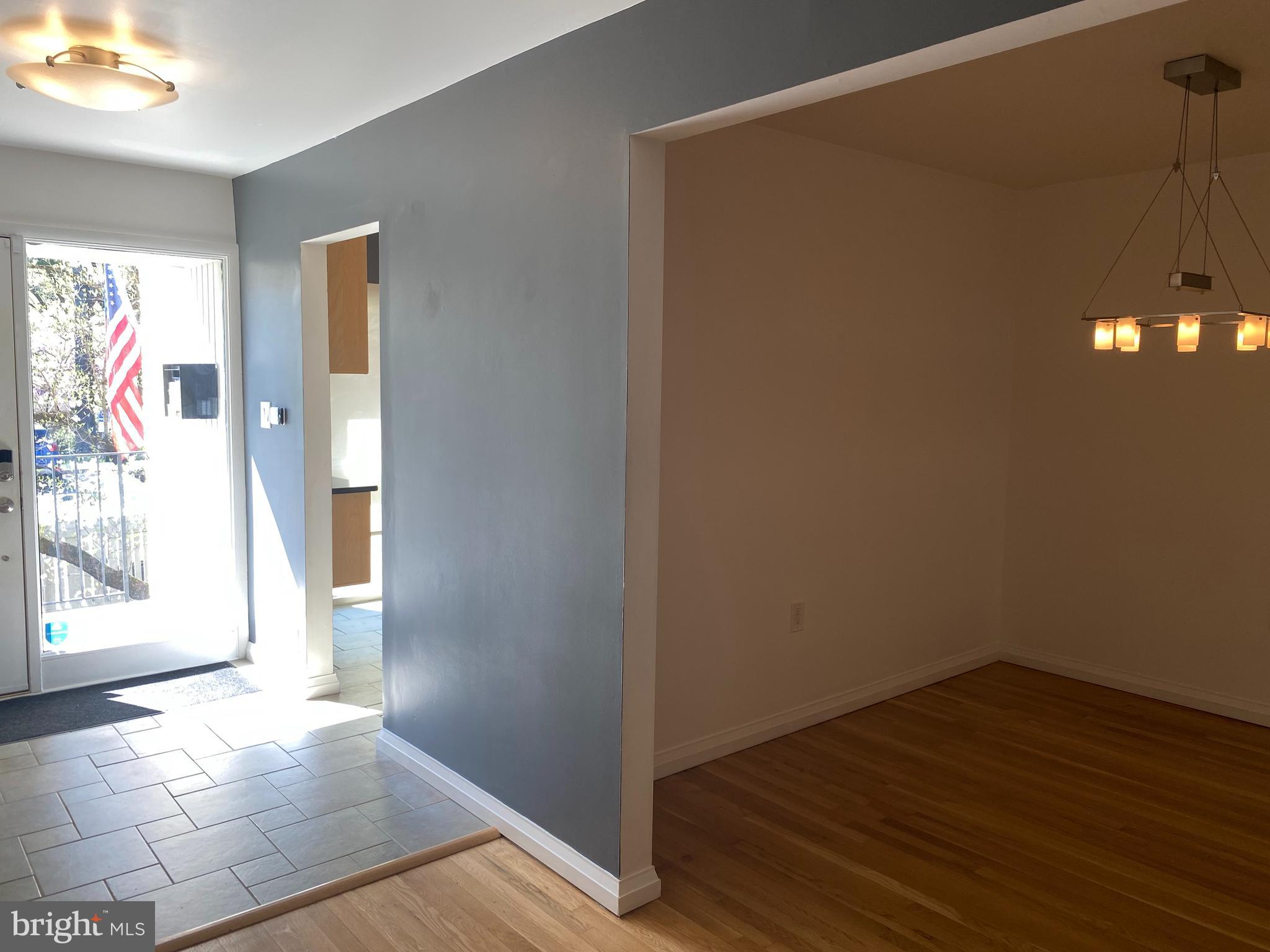 11142 Saffold Way Reston, VA 20190 - Photo 21 of 102 Entry hall way into dining room