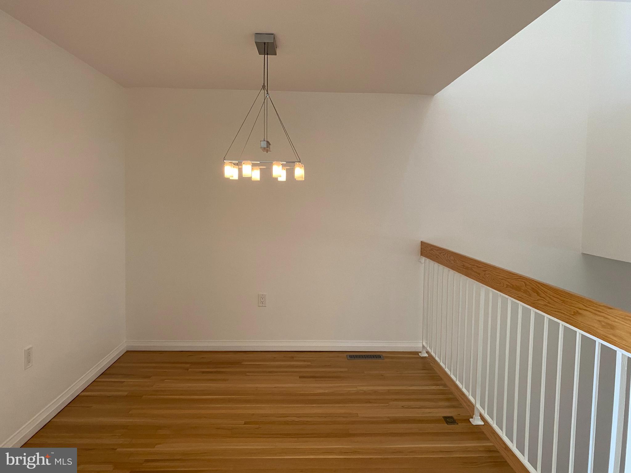 11142 Saffold Way Reston, VA 20190 - Photo 23 of 102 Entry level dining room hardwoods