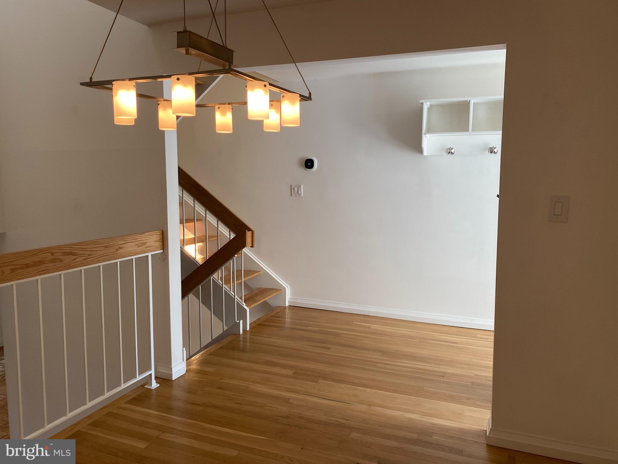 11142 Saffold Way Reston, VA 20190 - Photo 26 of 102 Entry level dining room into hallway