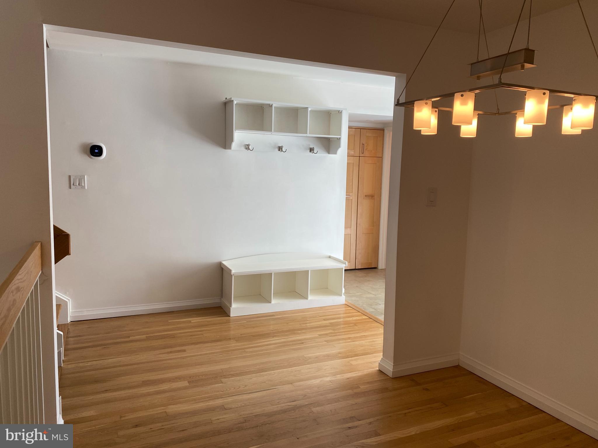 11142 Saffold Way Reston, VA 20190 - Photo 27 of 102 Dining room into main hall way & foyer view