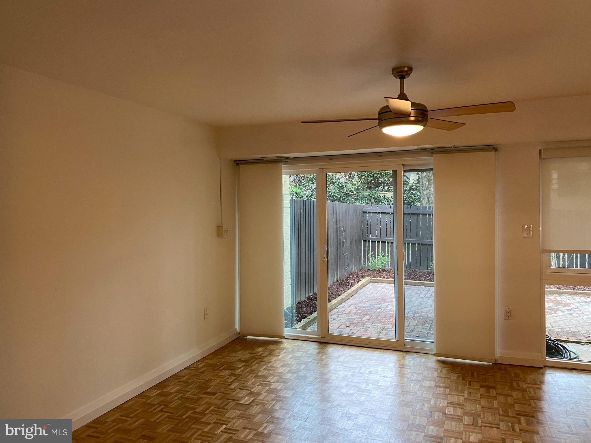 11142 Saffold Way Reston, VA 20190 - Photo 28 of 102 Living room looking into the rear courtyard