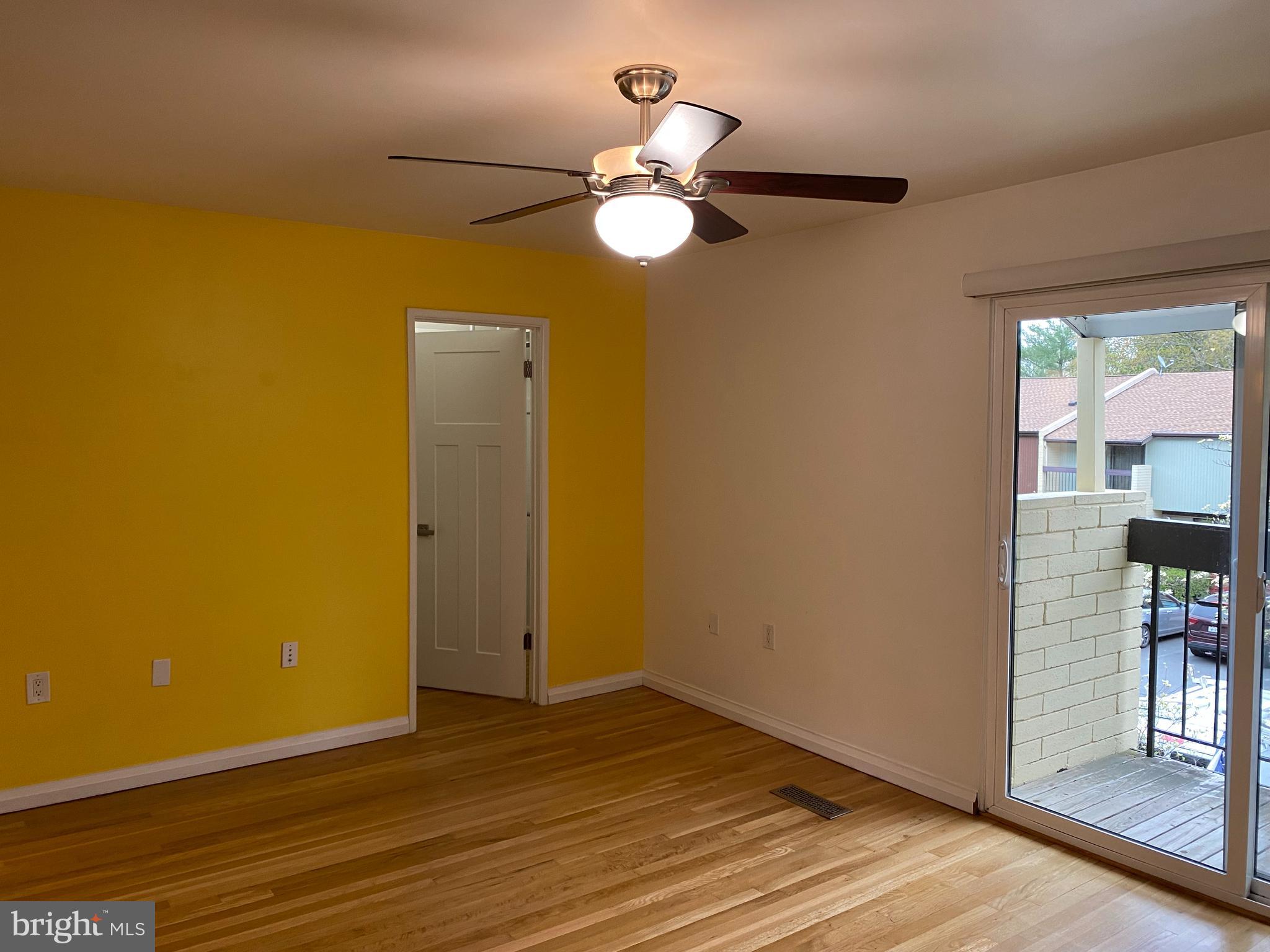 11142 Saffold Way Reston, VA 20190 - Photo 49 of 102 Primary bedroom view of baloney & walk in closet