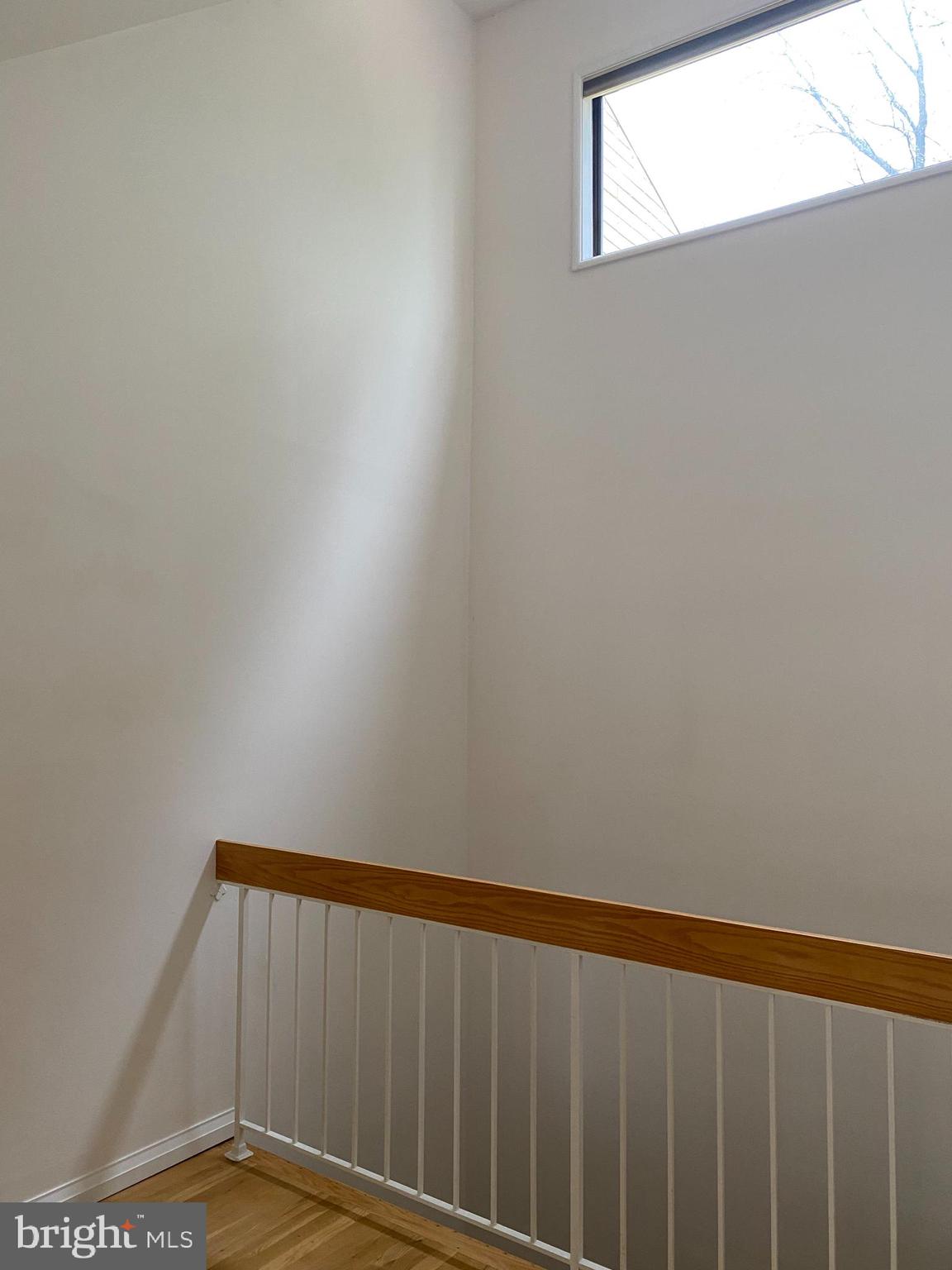 11142 Saffold Way Reston, VA 20190 - Photo 55 of 102 Primary sitting room light and view to main