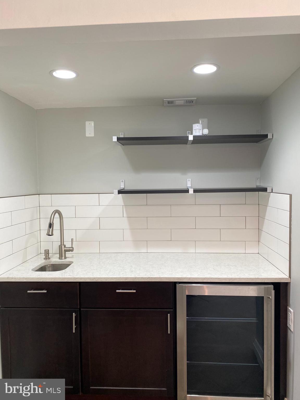11142 Saffold Way Reston, VA 20190 - Photo 66 of 102 Closer view of the kitchen bar area