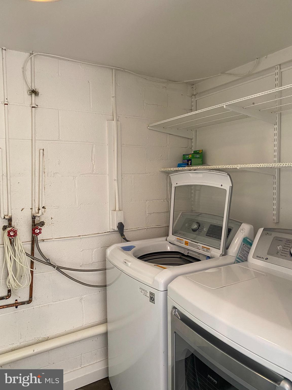 11142 Saffold Way Reston, VA 20190 - Photo 67 of 102 Lower level laundry complete w/ washer & dryer