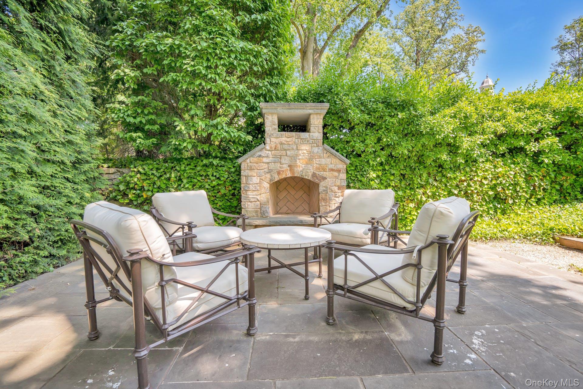 191 Elderfields Road Manhasset, NY 11030 - Photo 25 of 34 Fire Pit w. blue stone patio and bocce ball court