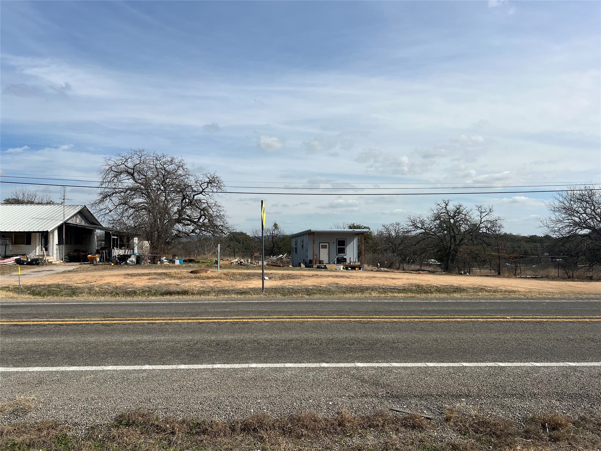0 Ranch Road 2545 Kingsland, TX 78639 - Photo 2 of 22 a view of a houses with a yard