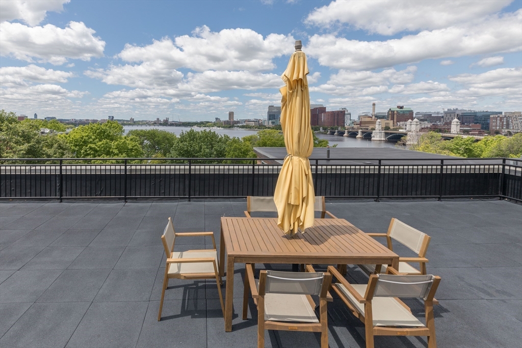 145 Pinckney Street, Unit 719 Boston, MA 02114 - Photo 7 of 11 a view of a terrace with furniture