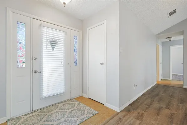 a view of an empty room with window