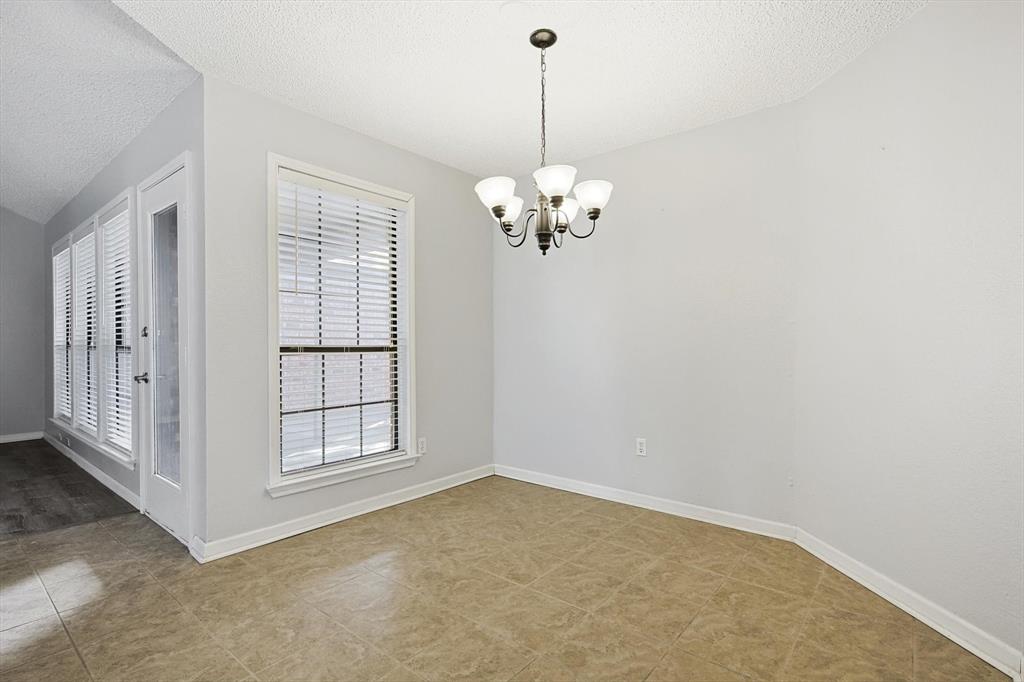 266 Pinyon Lane Coppell, TX 75019 - Photo 6 of 20 a view of a chandelier in a room