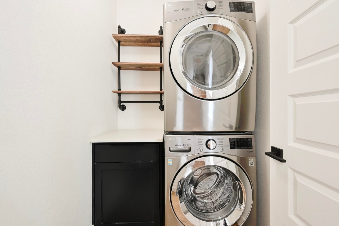 504 Normandy Street, Unit A Austin, TX 78745 - Photo 14 of 20 a utility room with dryer and washer