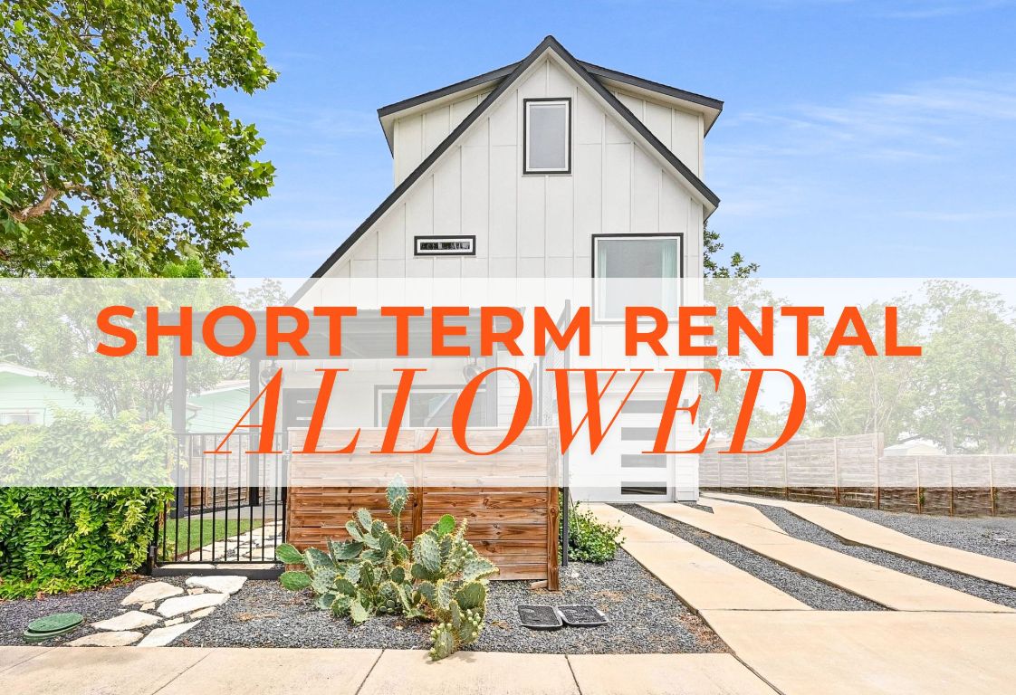 504 Normandy Street, Unit A Austin, TX 78745 - Photo 2 of 20 a street sign on a street corner