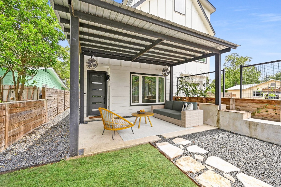 504 Normandy Street, Unit A Austin, TX 78745 - Photo 5 of 20 a building outdoor space with patio furniture