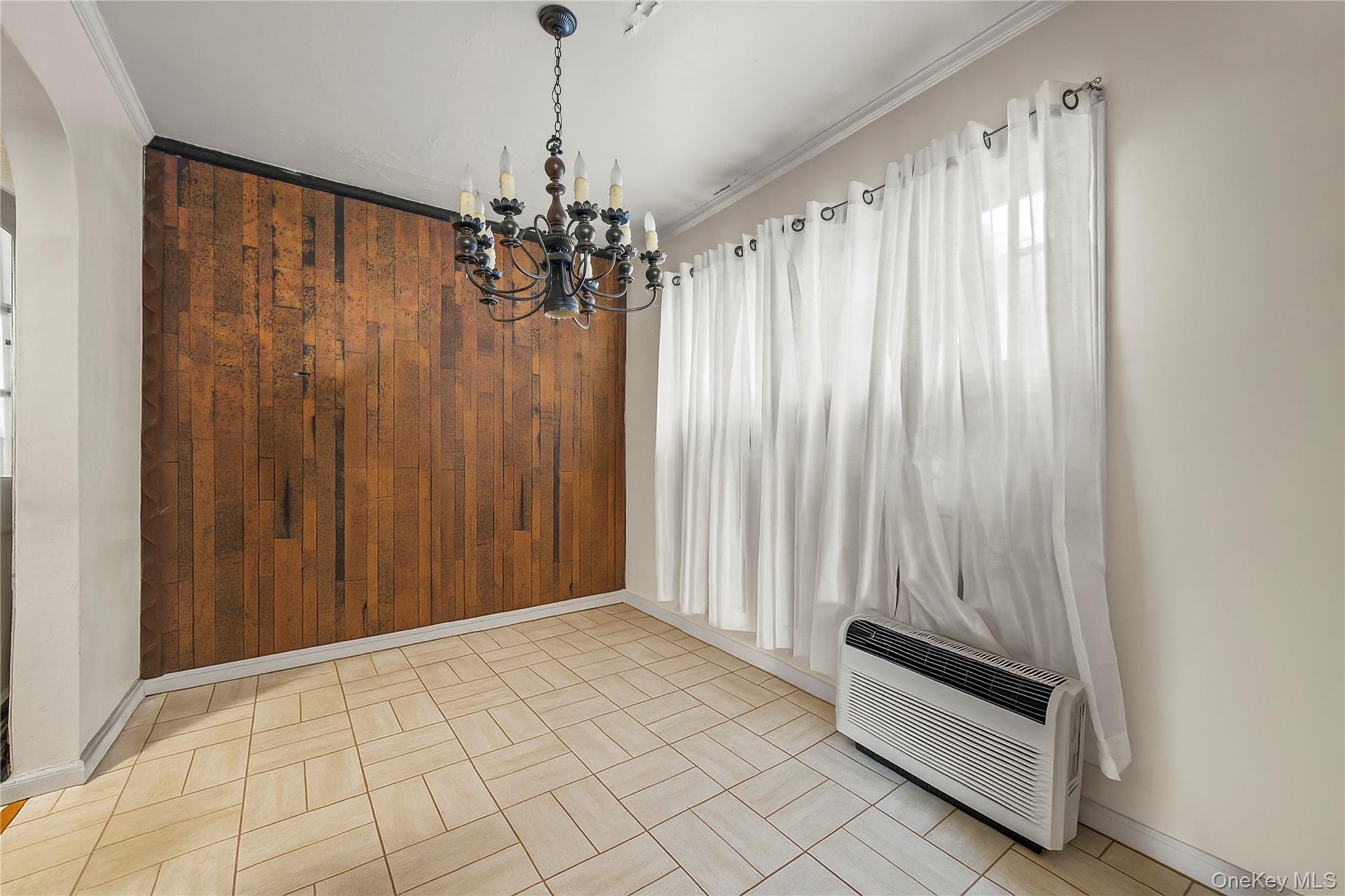 208 Dogwood Road Valley Stream, NY 11580 - Photo 15 of 38 a view of a room with a chandelier