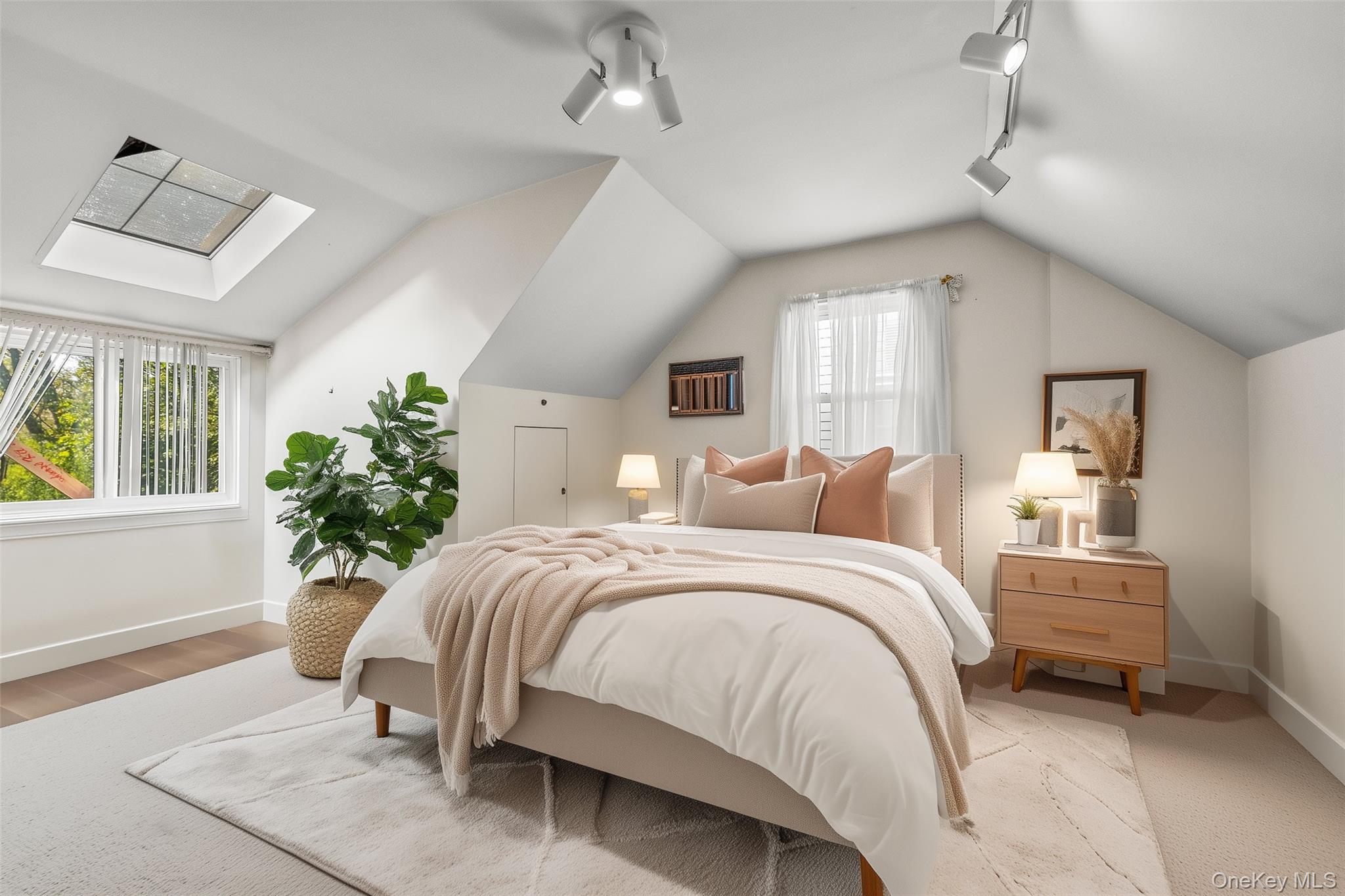 208 Dogwood Road Valley Stream, NY 11580 - Photo 20 of 38 a bedroom with a bed and potted plant on the dresser
