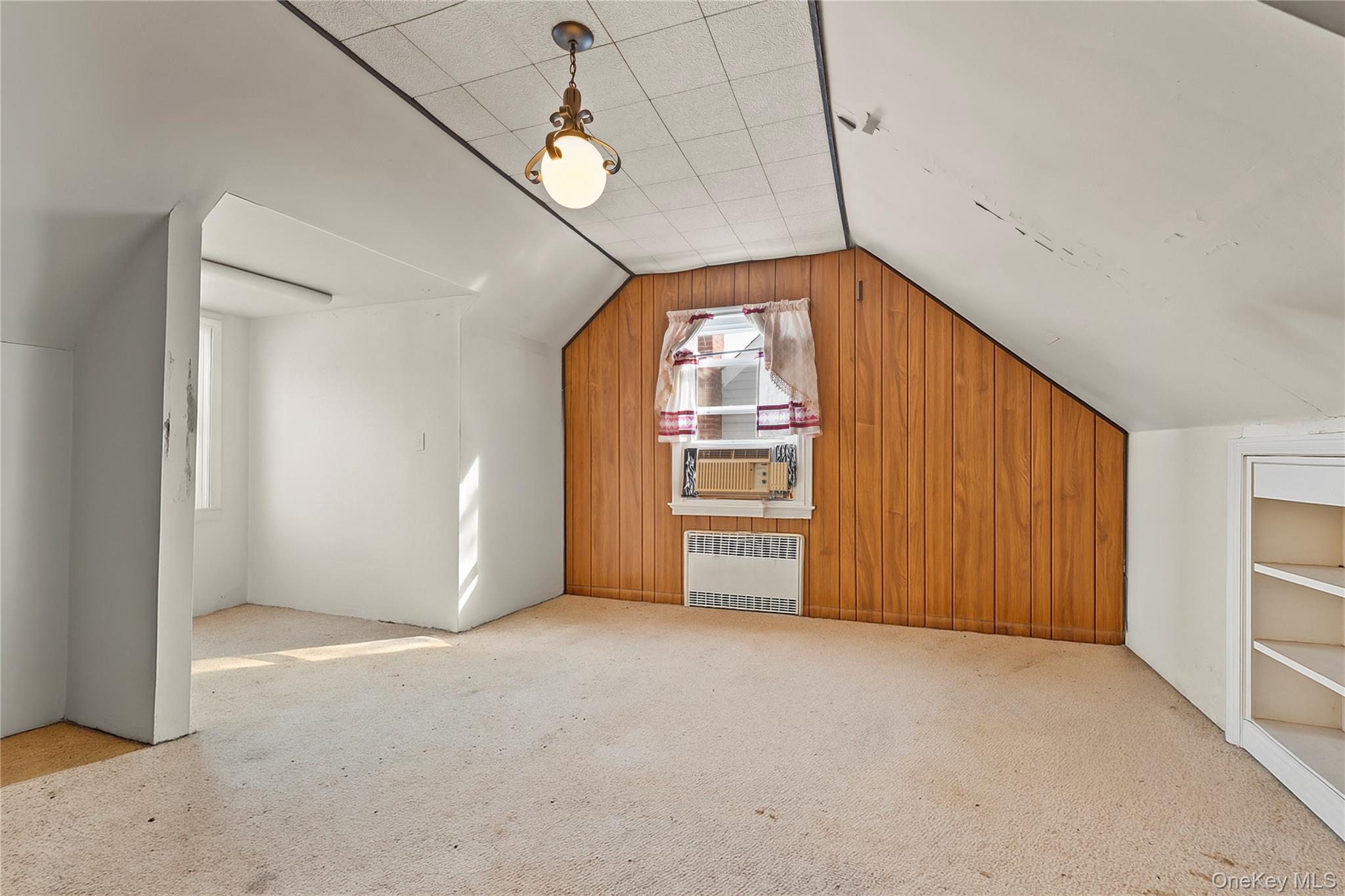 208 Dogwood Road Valley Stream, NY 11580 - Photo 23 of 38 an empty room with windows and closet