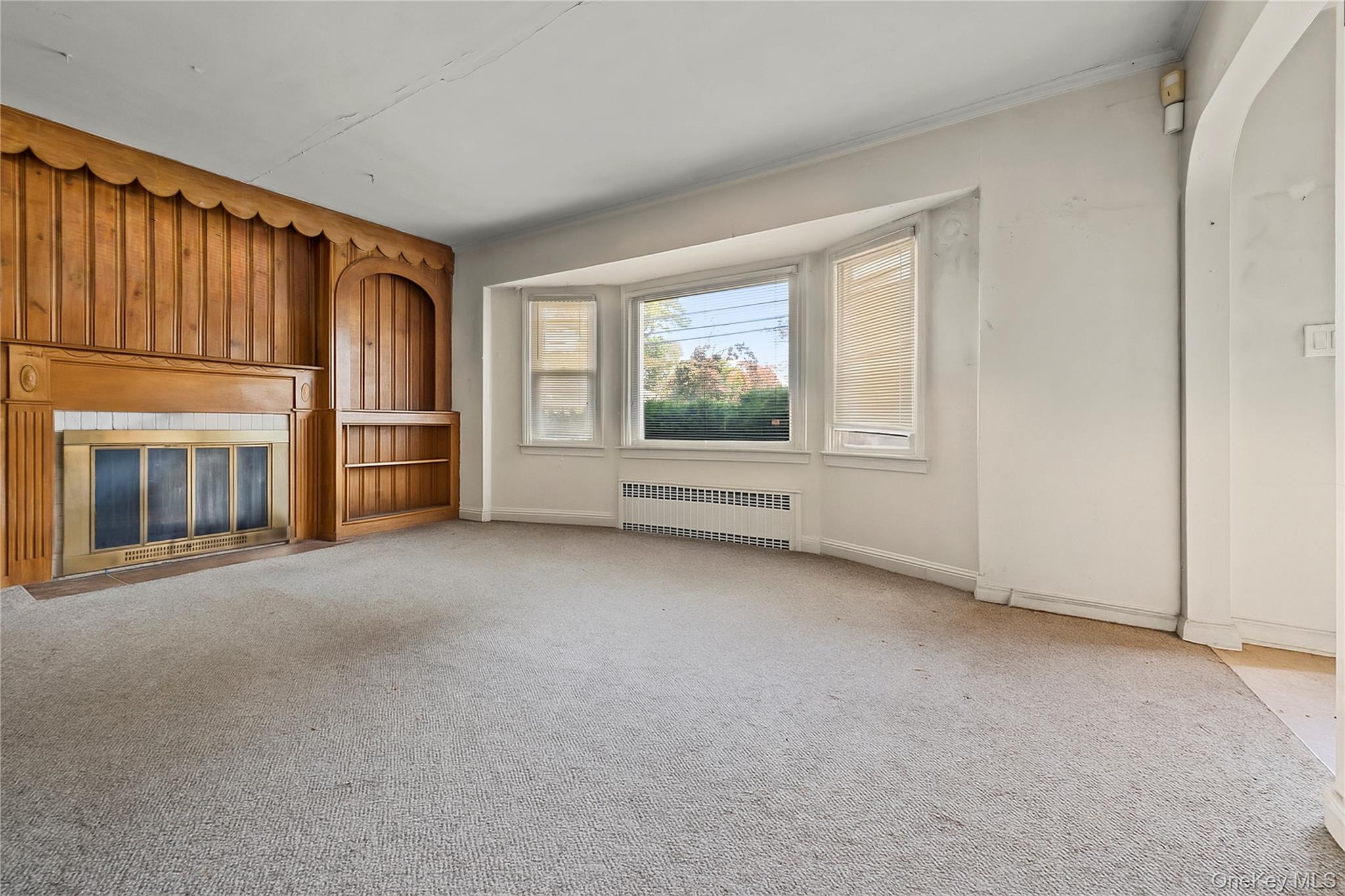 208 Dogwood Road Valley Stream, NY 11580 - Photo 4 of 38 a view of an empty room with a window