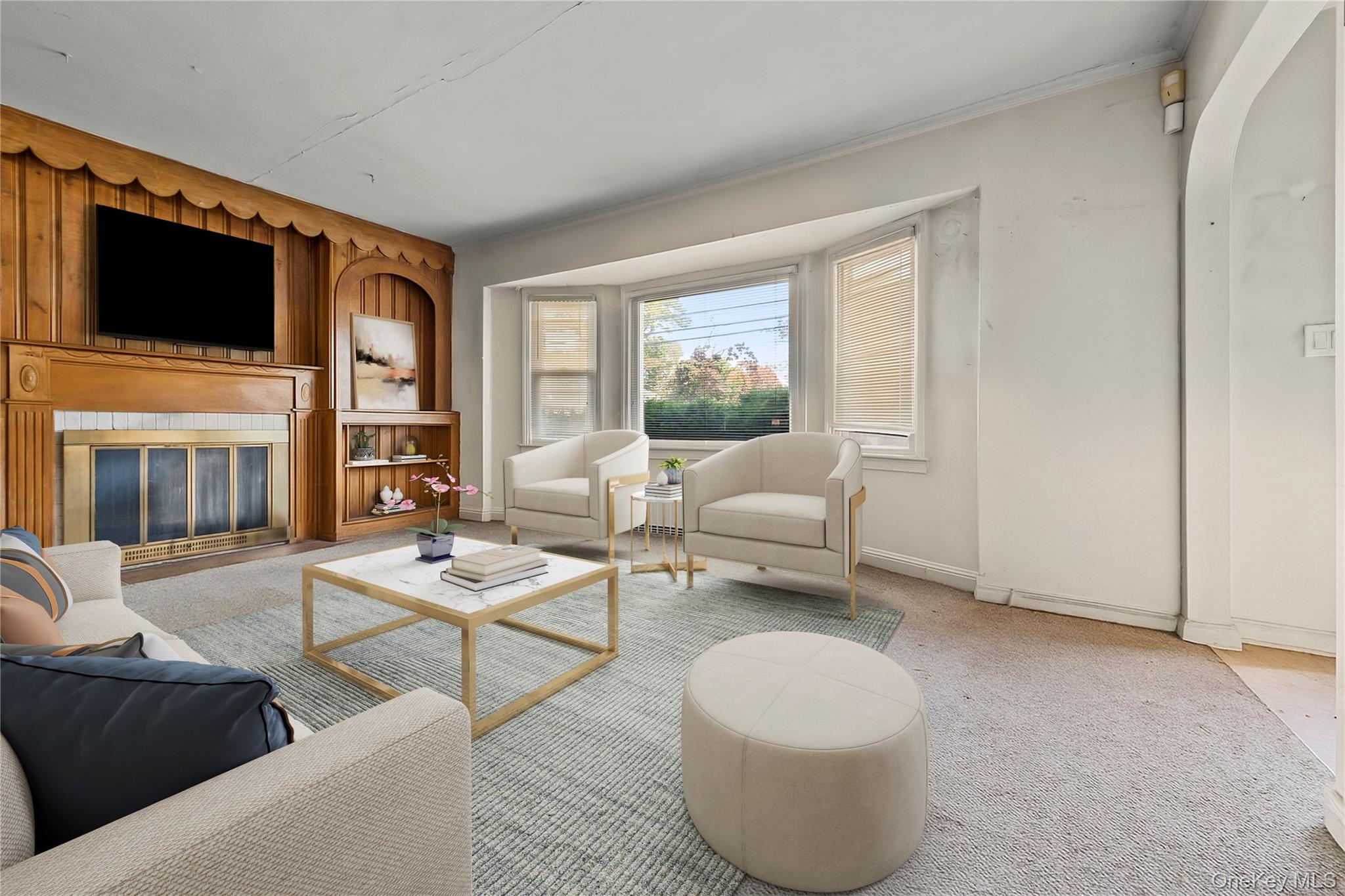 208 Dogwood Road Valley Stream, NY 11580 - Photo 5 of 38 a living room with furniture a flat screen tv and a window