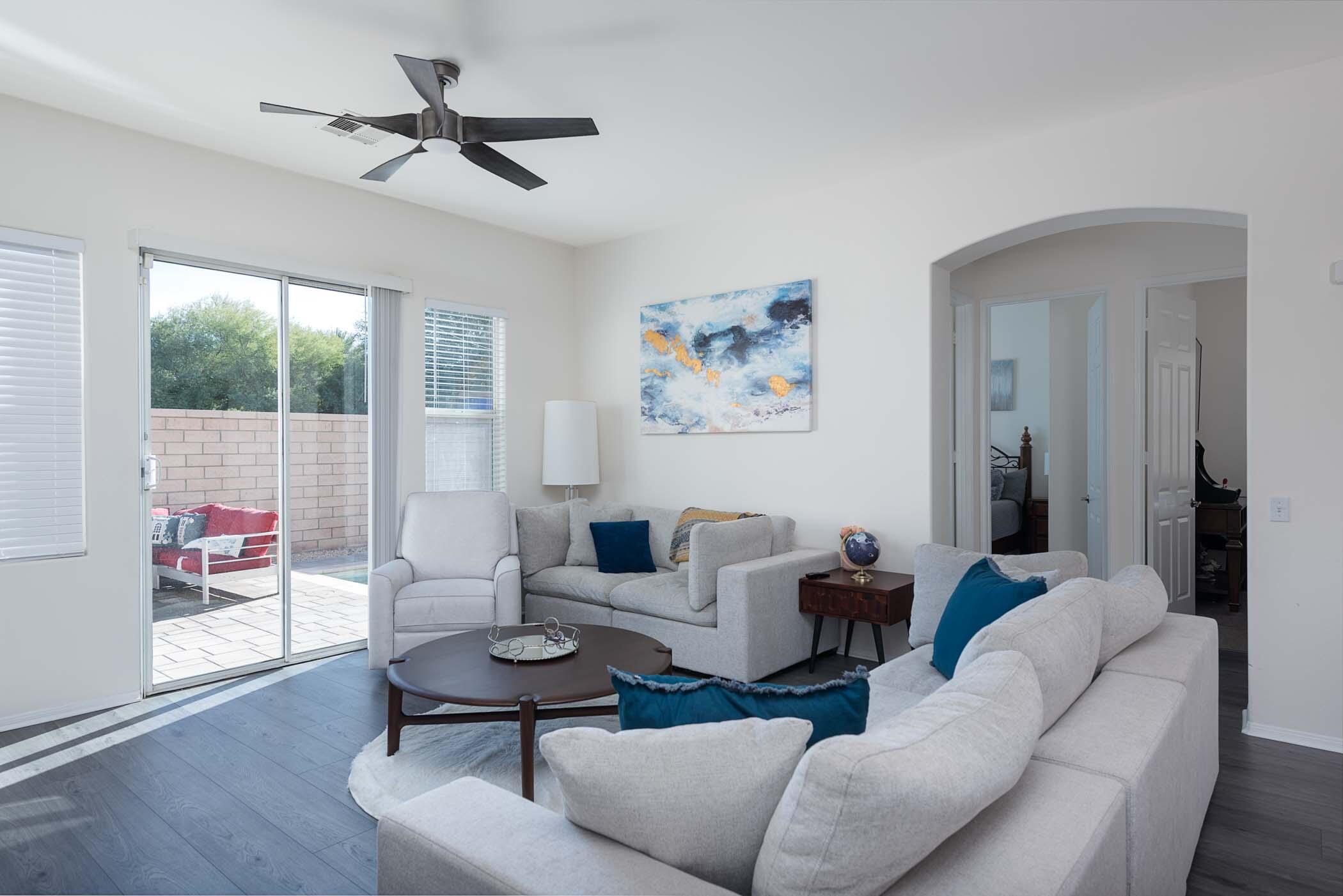 49534 Lewis Road Indio, CA 92201 - Photo 18 of 44 a living room with furniture and a large window